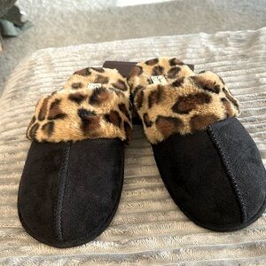 Black animal print winter slippers, size L (8-9). Very lightly worn.